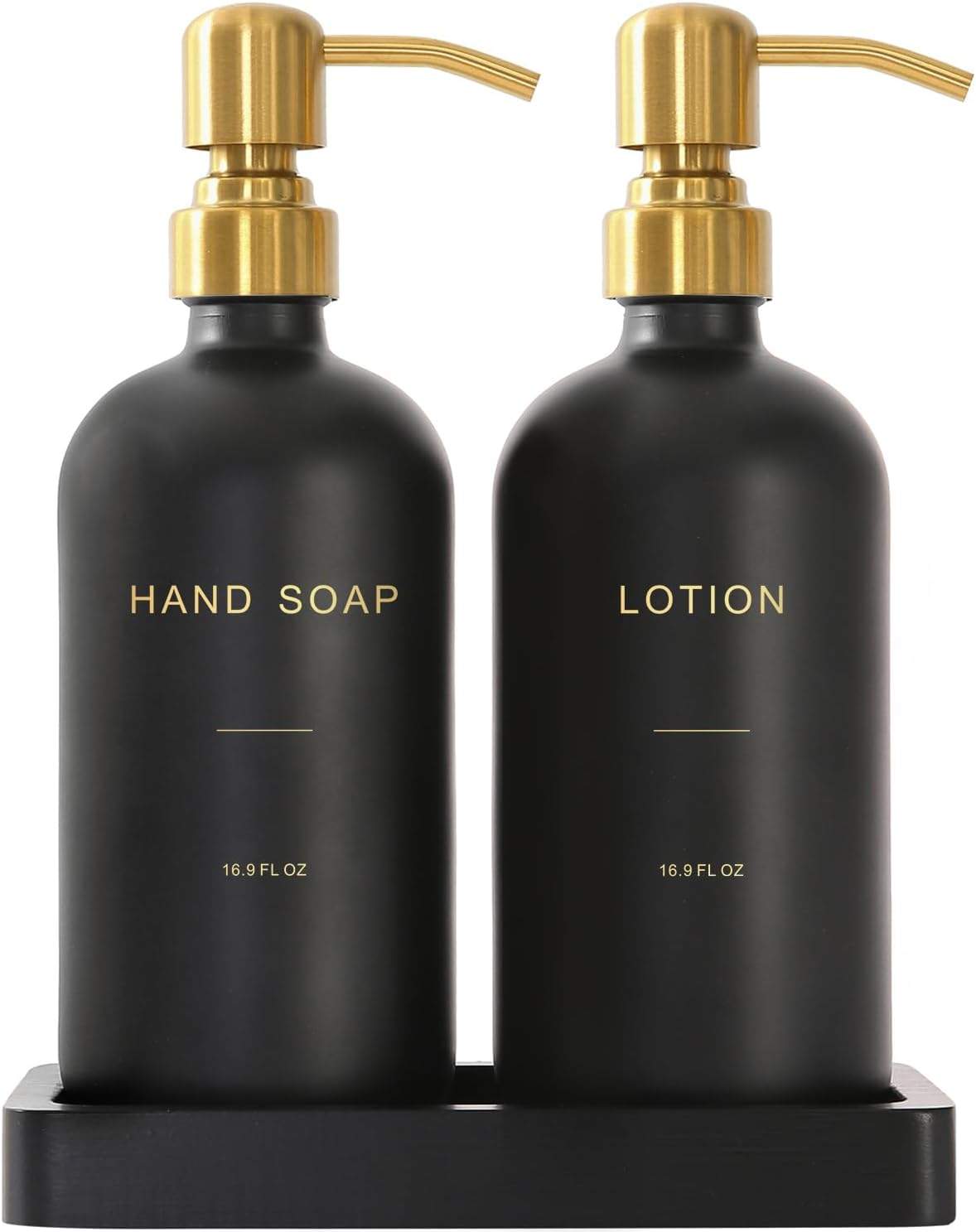 Matte black hand soap and lotion dispensers with brushed gold pumps on a bathroom vanity, styled with modern black and gold bathroom decor accents.