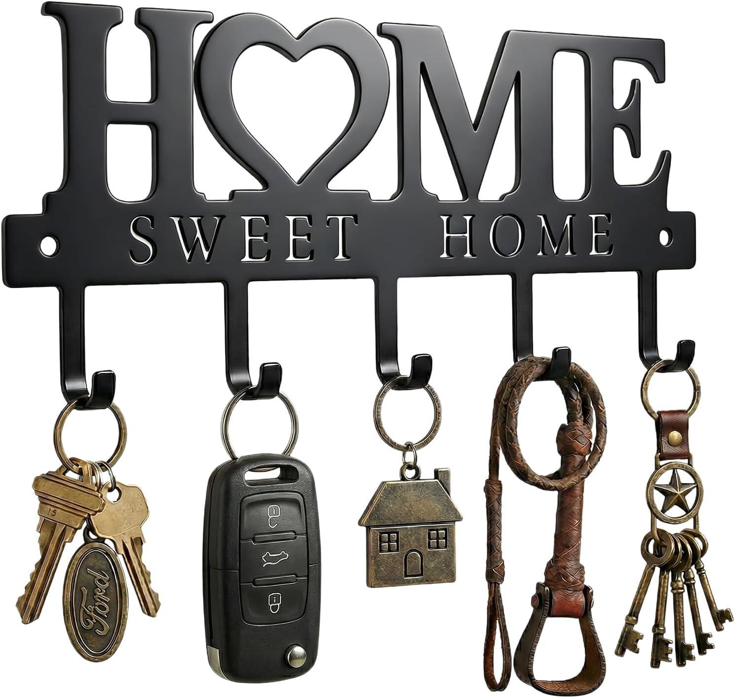 Black metal HOME entryway key holder ideas styling with five hooks holding keys and small everyday items, as a practical wall organizer with cozy decor appeal.